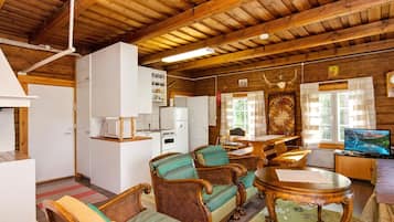 Cottage, Sauna | Living area | Flat-screen TV