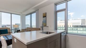 Luxury Apartment, 1 Bedroom | Private kitchen | Fridge, microwave, oven, stovetop