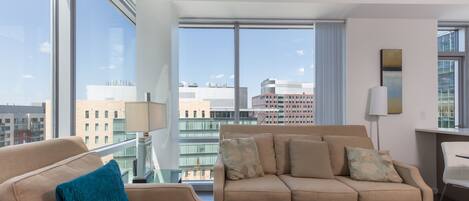 Luxury Apartment, 1 Bedroom | Living room | Flat-screen TV