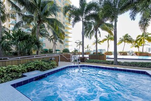 Outdoor pool, pool umbrellas, sun loungers