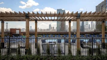 Outdoor pool, pool umbrellas, sun loungers