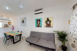Comfort House, 2 Bedrooms, Balcony | Living area | Flat-screen TV