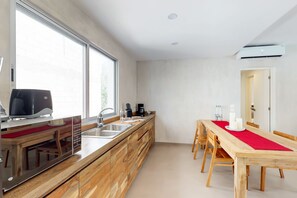 Superior Apartment, 2 Bedrooms, Balcony | Private kitchen | Full-size fridge, microwave, oven, stovetop - Bananquit 06 @ Xaman (Tulum)