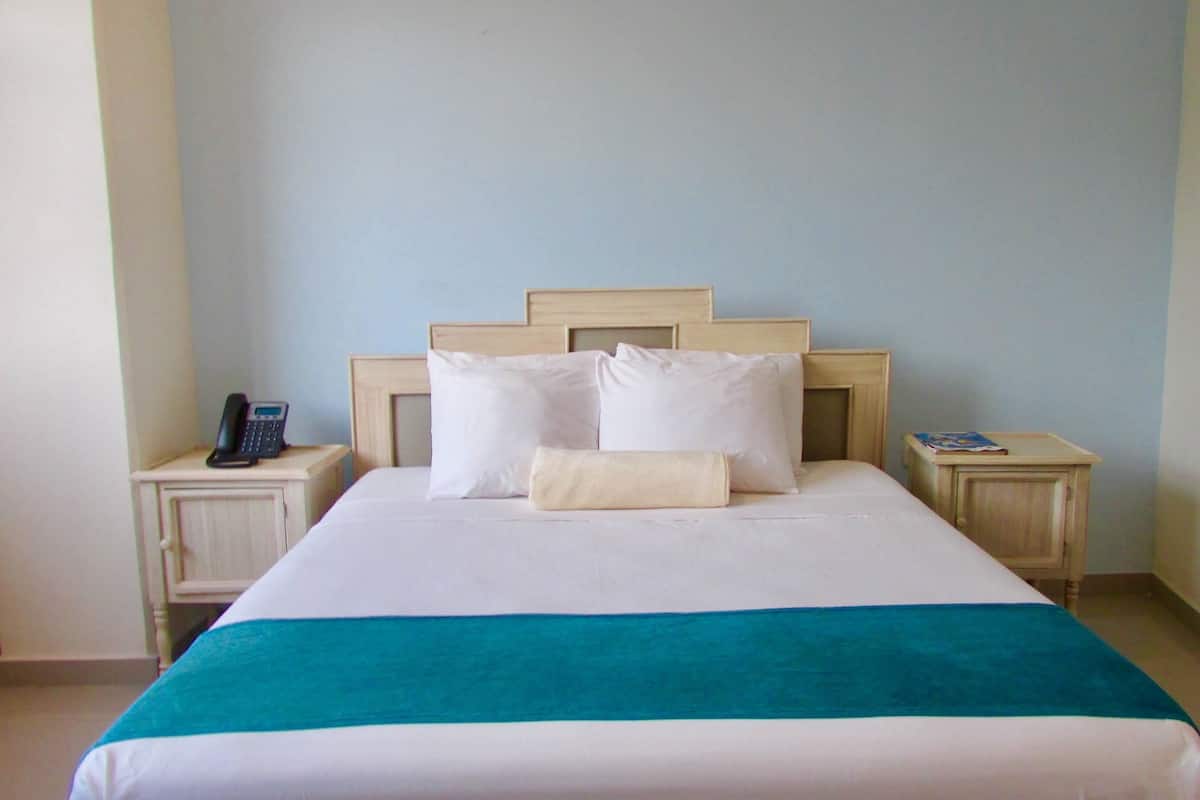Premium bedding, in-room safe, desk, soundproofing