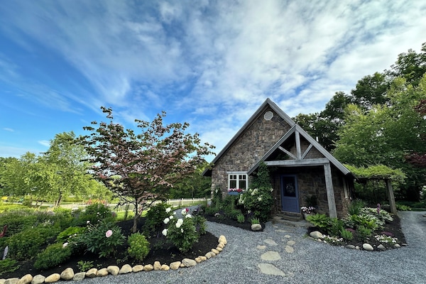 Provincial Inspired Stone Cottage. View of entrance from the driveway.
