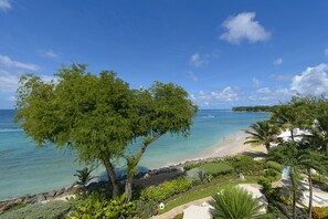 On the beach, sun loungers, beach towels