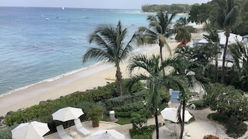 On the beach, sun-loungers, beach towels