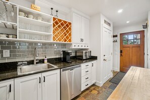 Fridge, microwave, dishwasher, coffee/tea maker