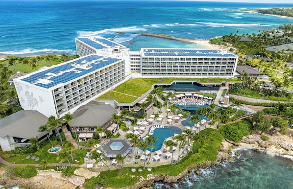 A resort with multiple buildings, a pool area, and a beach. - Turtle Bay Top Floor Studio + LOFT with Split AC & Golf Course Views (Kahuku)