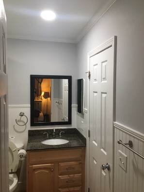 Bathtub, towels, toilet paper