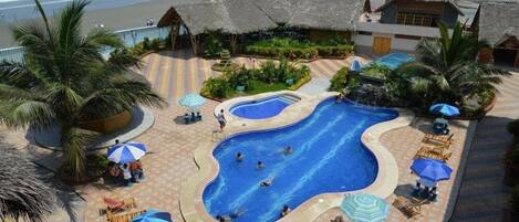 Outdoor pool, pool umbrellas, sun loungers