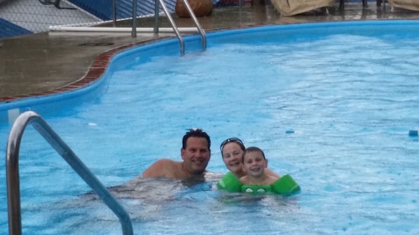 Seasonal outdoor pool, open 10 AM to 10 PM, pool umbrellas