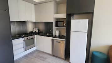 Appartement Standard, 1 chambre | Cuisine privée | Grand réfrigérateur, micro-ondes, four, plaque de cuisson