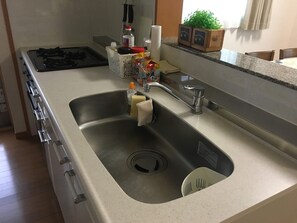 Apartment, 2 Bedrooms | Private kitchenette | Fridge, microwave, stovetop, electric kettle - Ganesha (Yomitan)