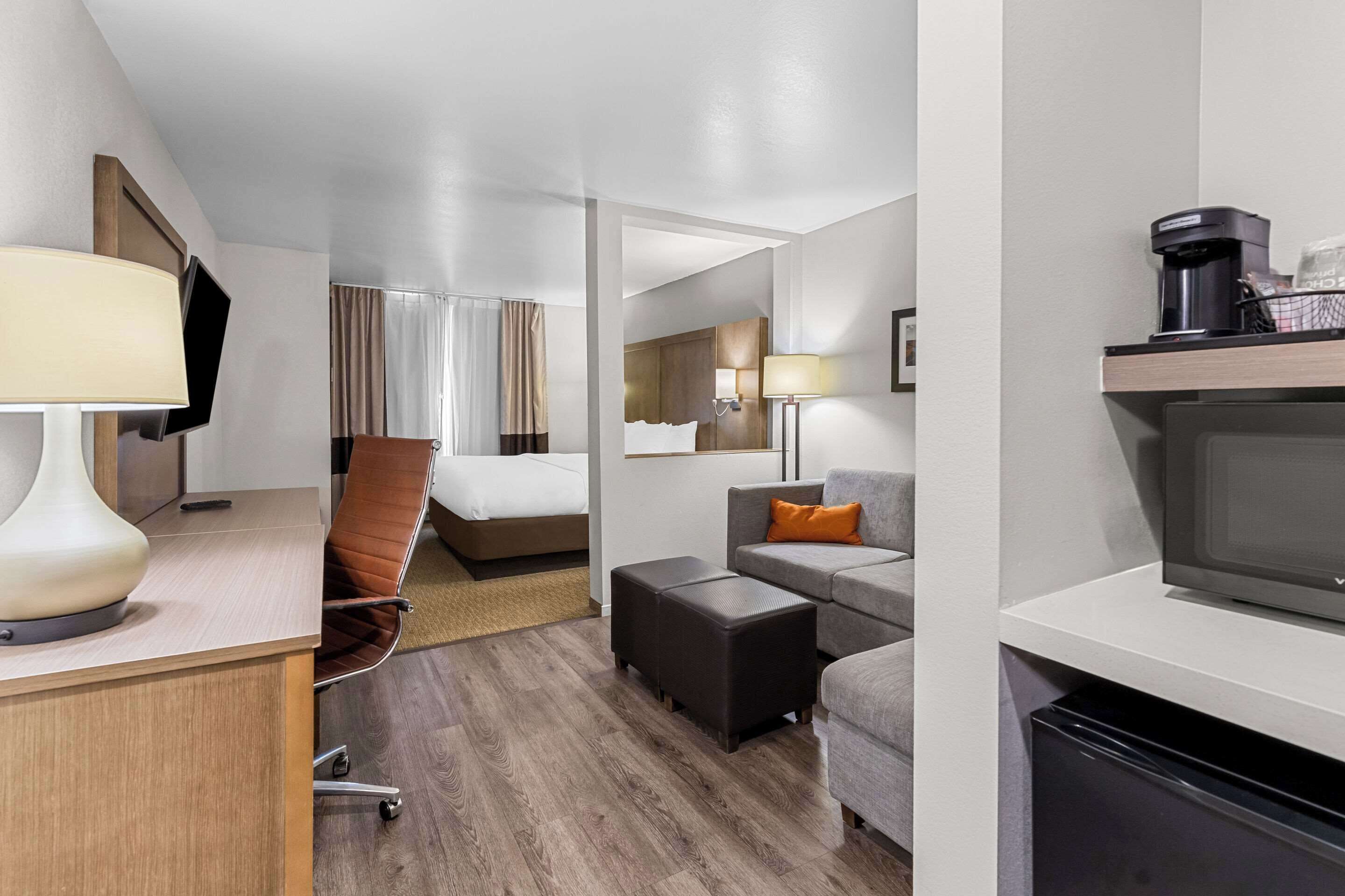 suite, 1 king bed with sofa bed, non smoking | desk, blackout curtains, iron/ironing board, free wifi