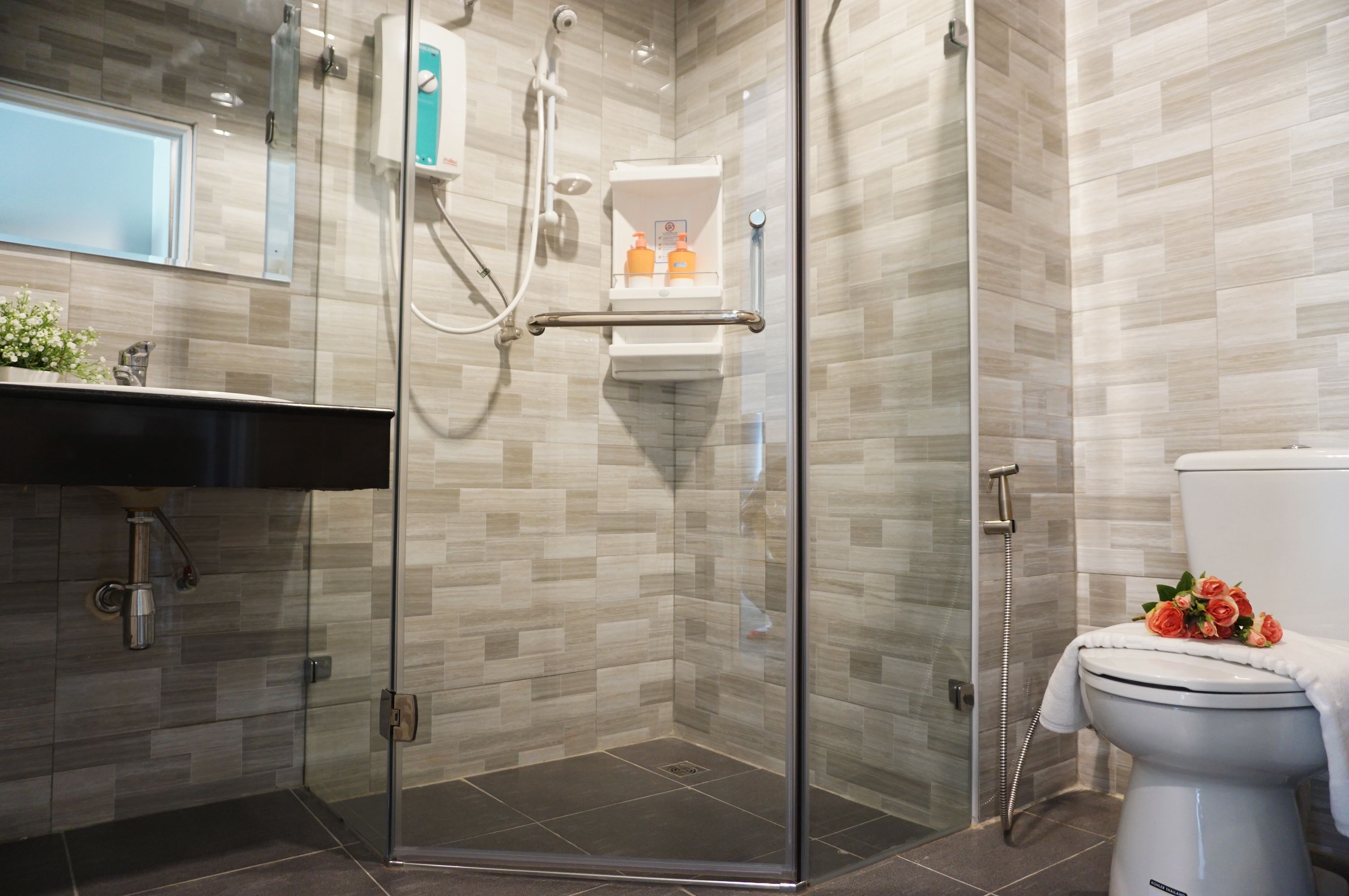 shower, free toiletries, hair dryer, towels