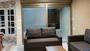 Classic Apartment, Balcony | Living area | Flat-screen TV - Shalva Mol Kinneret (Migdal)