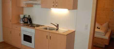 Fridge, oven, dishwasher, highchair