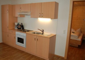 Fridge, oven, dishwasher, highchair