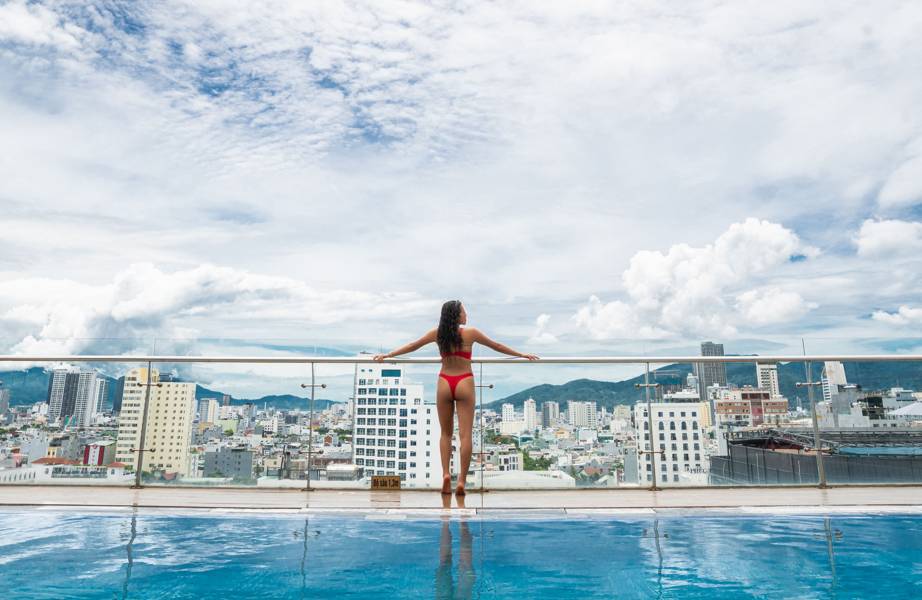 outdoor pool, open 6:00 am to 6:00 pm, pool umbrellas, pool loungers