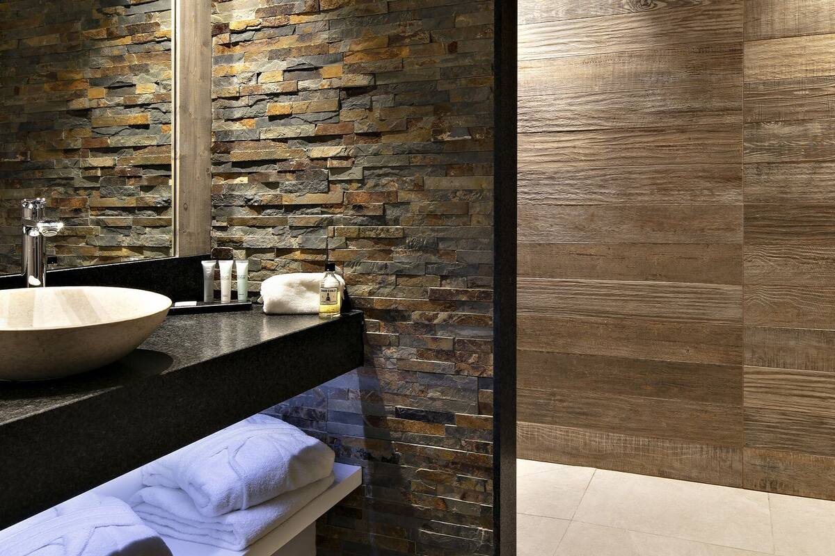 family apartment | bathroom | shower, hair dryer, slippers, towels