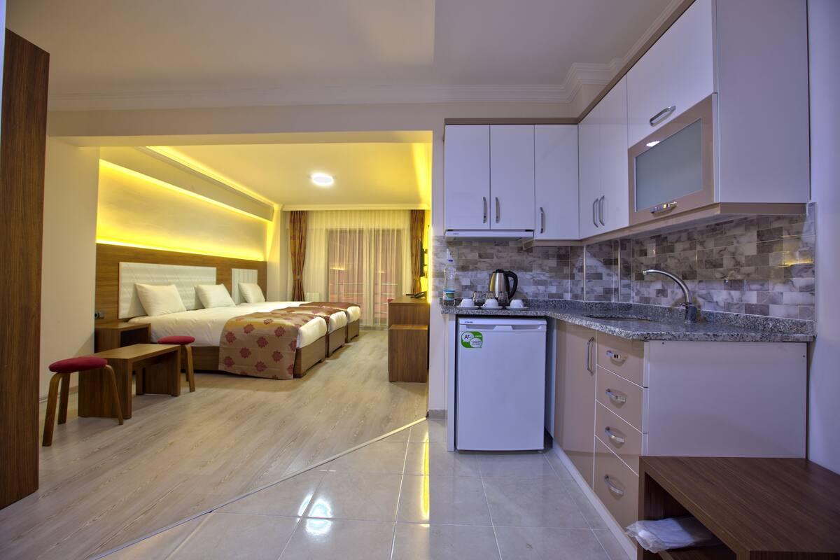 business triple room | minibar, in-room safe, desk, blackout curtains