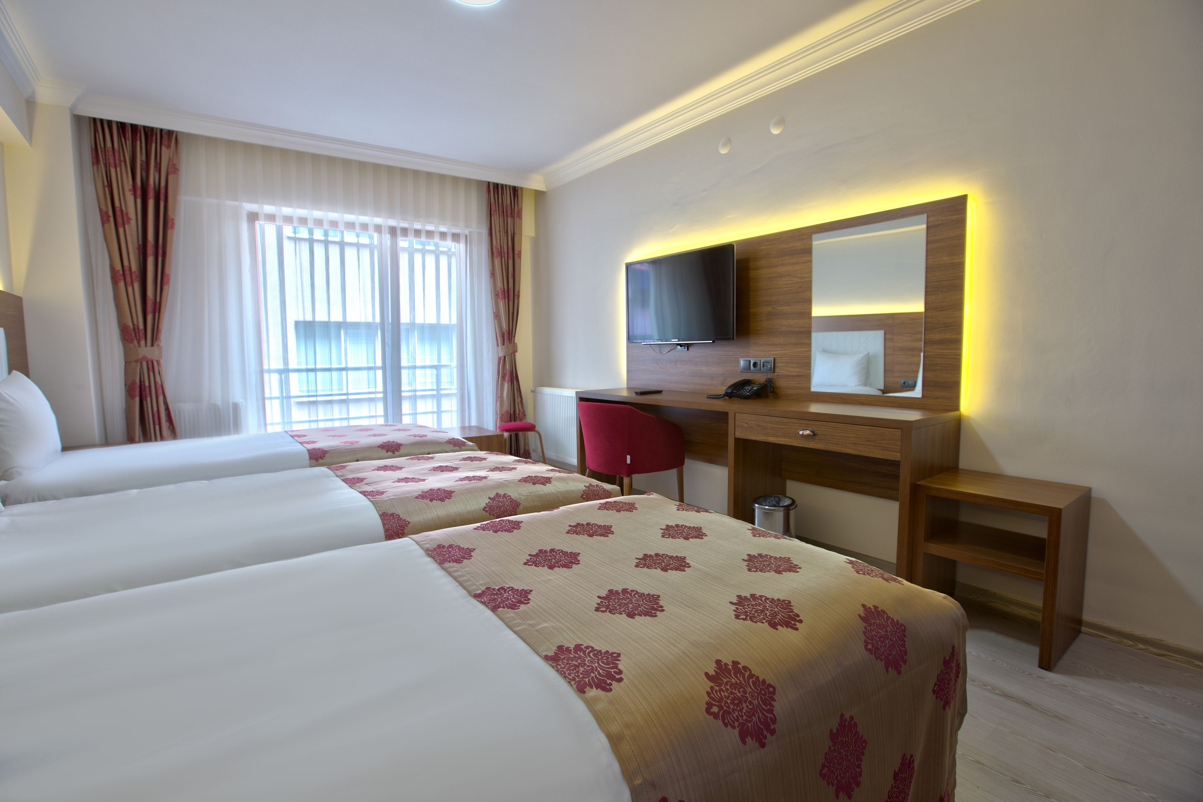 business triple room | minibar, in-room safe, desk, blackout curtains