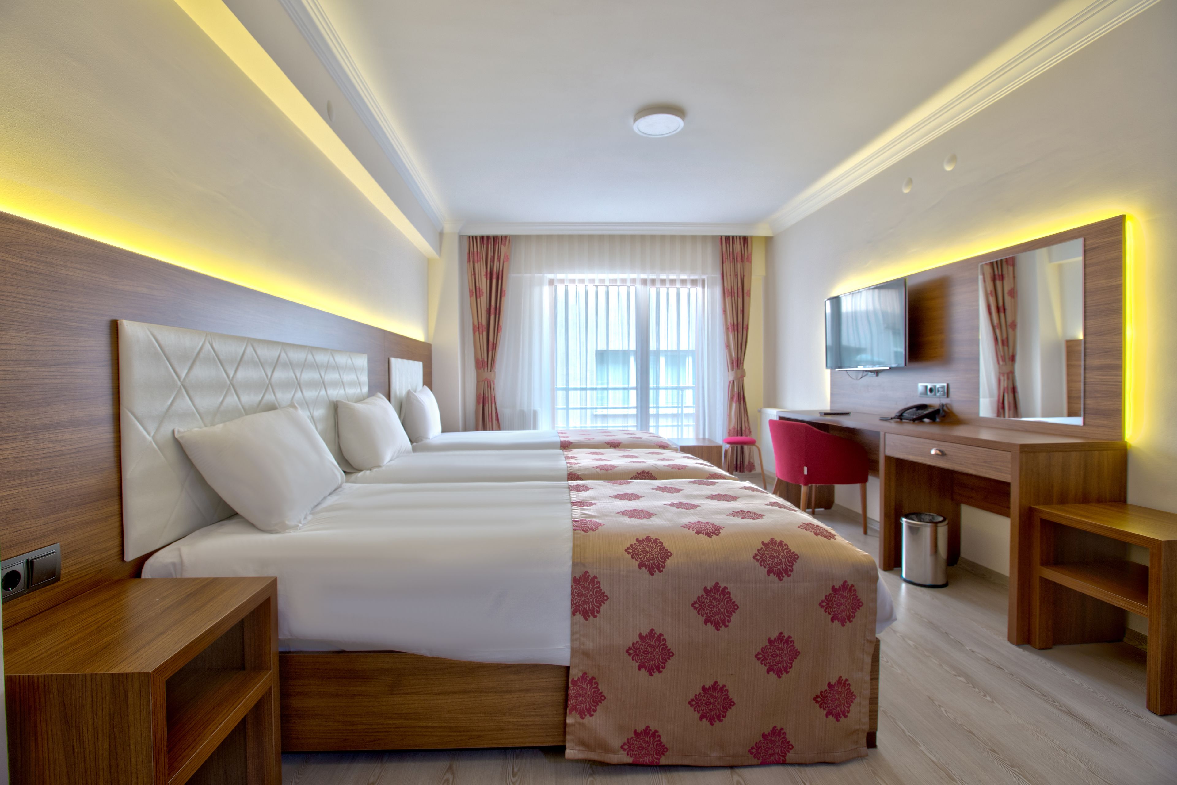 business triple room | minibar, in-room safe, desk, blackout curtains