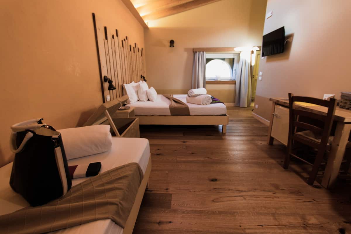 Exclusive Triple Room, 1 Queen Bed (Genziana) | 1 bedroom, Frette Italian sheets, premium bedding, down comforters