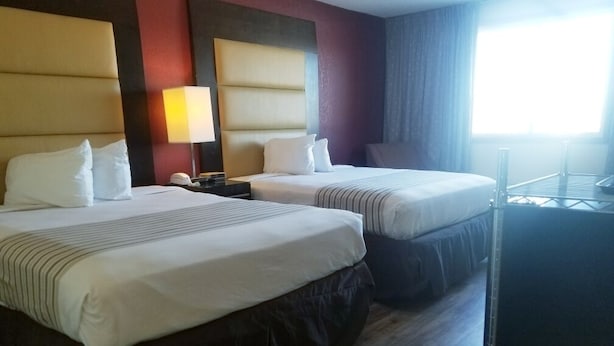 Desk, blackout curtains, iron/ironing board, bed sheets