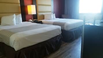 Desk, blackout drapes, iron/ironing board, bed sheets