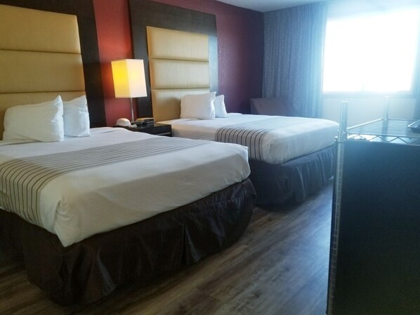 Desk, blackout drapes, iron/ironing board, bed sheets