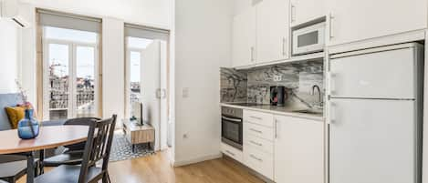 Standard Studio, 1 Bedroom, Balcony, City View | Private kitchen | Full-sized fridge, microwave, stovetop, espresso maker