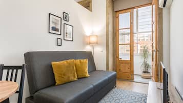 Superior Apartment, 1 Bedroom | Living area | Flat-screen TV