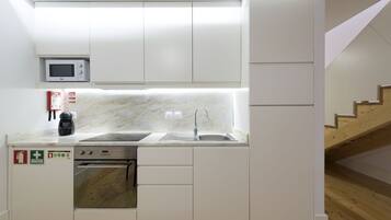 Standard Studio, 1 Bedroom, Mezzanine | Private kitchen | Full-sized fridge, microwave, oven, stovetop