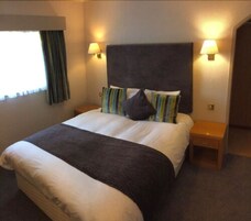 Standard Double Room | Desk, blackout curtains, iron/ironing board, free WiFi