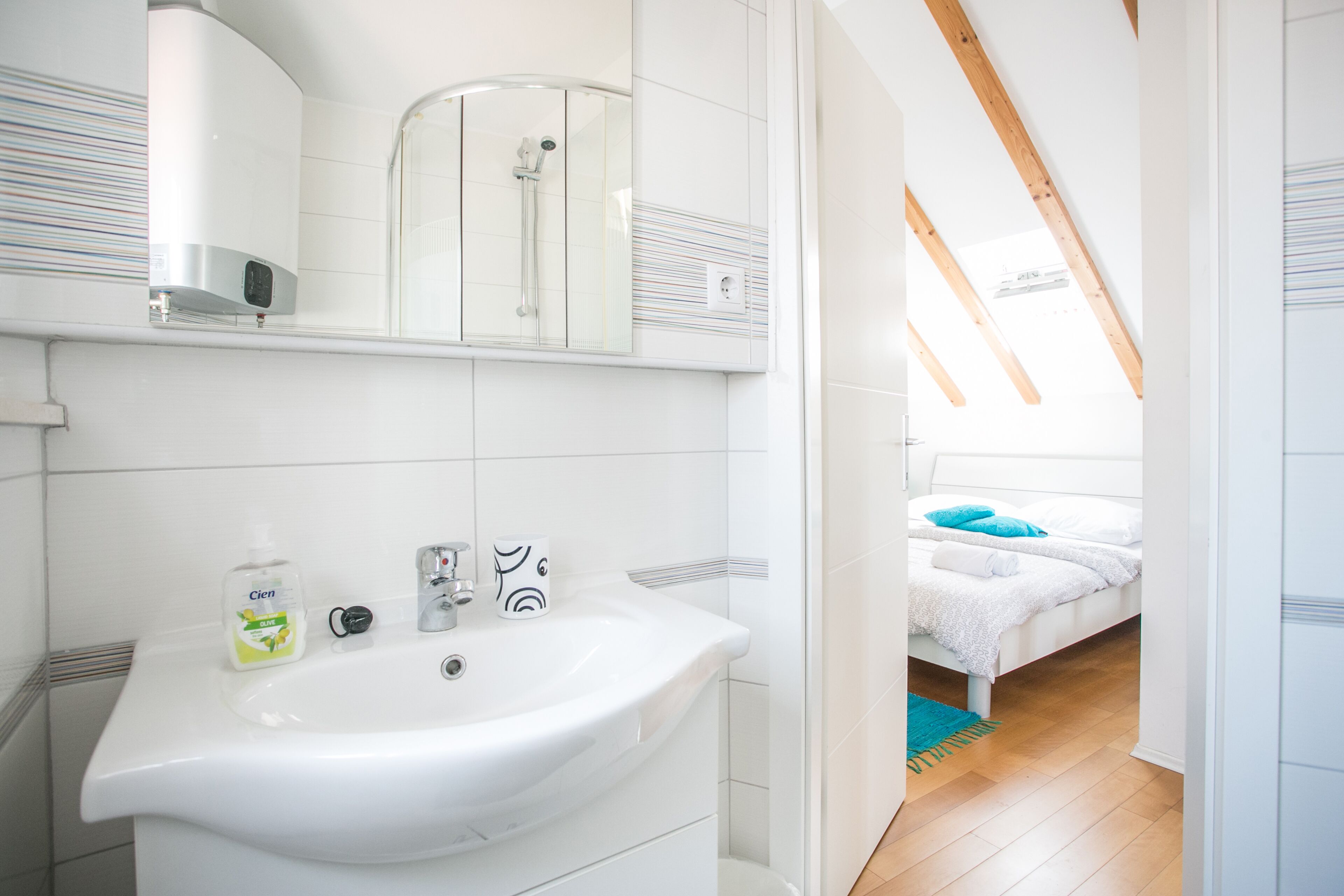 city studio | bathroom | shower, hair dryer, towels, soap