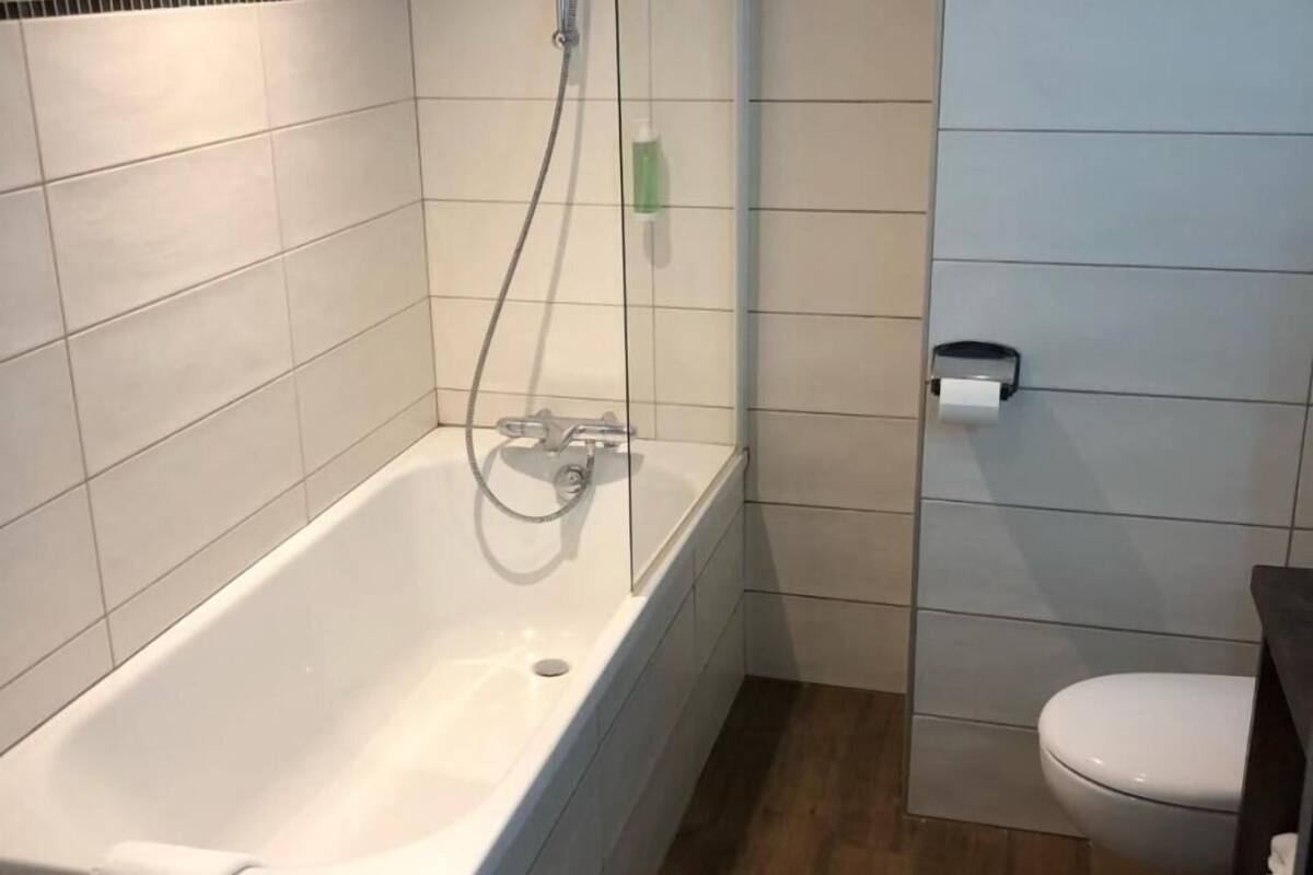 deep-soaking bathtub, free toiletries, hair dryer, bathrobes