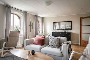 Apartment, 2 Bedrooms | Living area | 50-inch Smart TV with digital channels, streaming services
