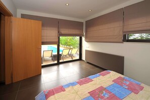 Deluxe Villa, Multiple Beds, Non Smoking | 4 bedrooms, iron/ironing board, free WiFi, bed sheets