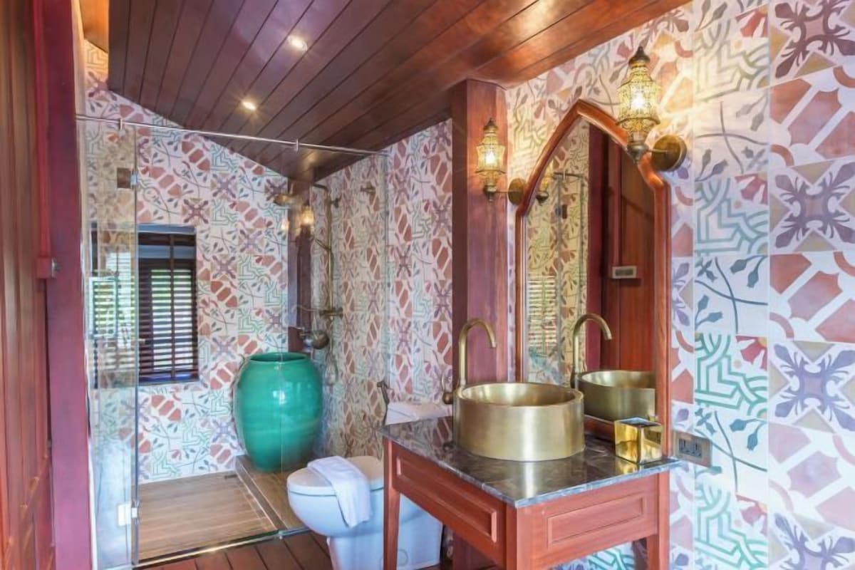 Bathroom | Shower, designer toiletries, hair dryer, bathrobes