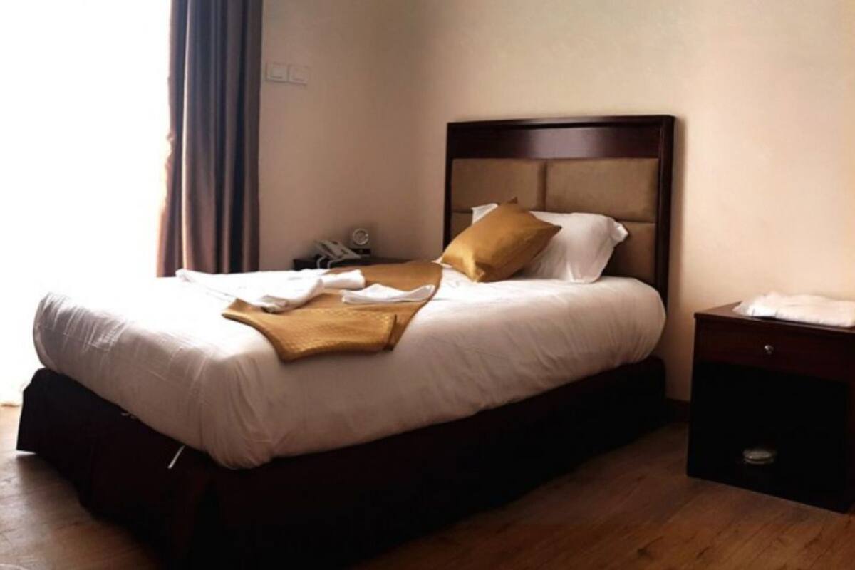 Habitación individual básica | 1 habitación, ropa de cama de alta calidad y minibar