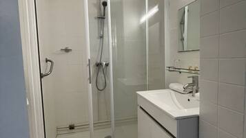 Shower, free toiletries, hair dryer, towels