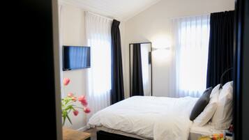 Standard dubbelrum eller tvÄbÀddsrum | VÀrdeförvaringsskÄp pÄ rummet och mörklÀggningsgardiner