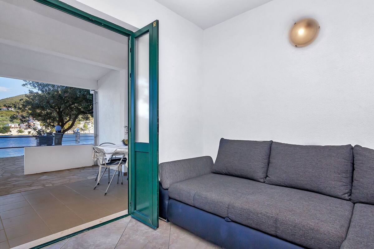 Apartment, 1 Bedroom, Sea View, Ground Floor | 1 bedroom, desk, free WiFi, bed sheets