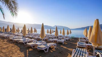 Private beach, sun-loungers, beach umbrellas