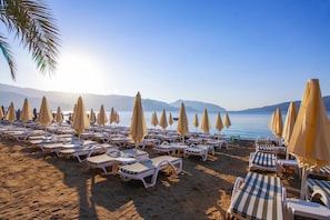 Private beach, sun-loungers, beach umbrellas