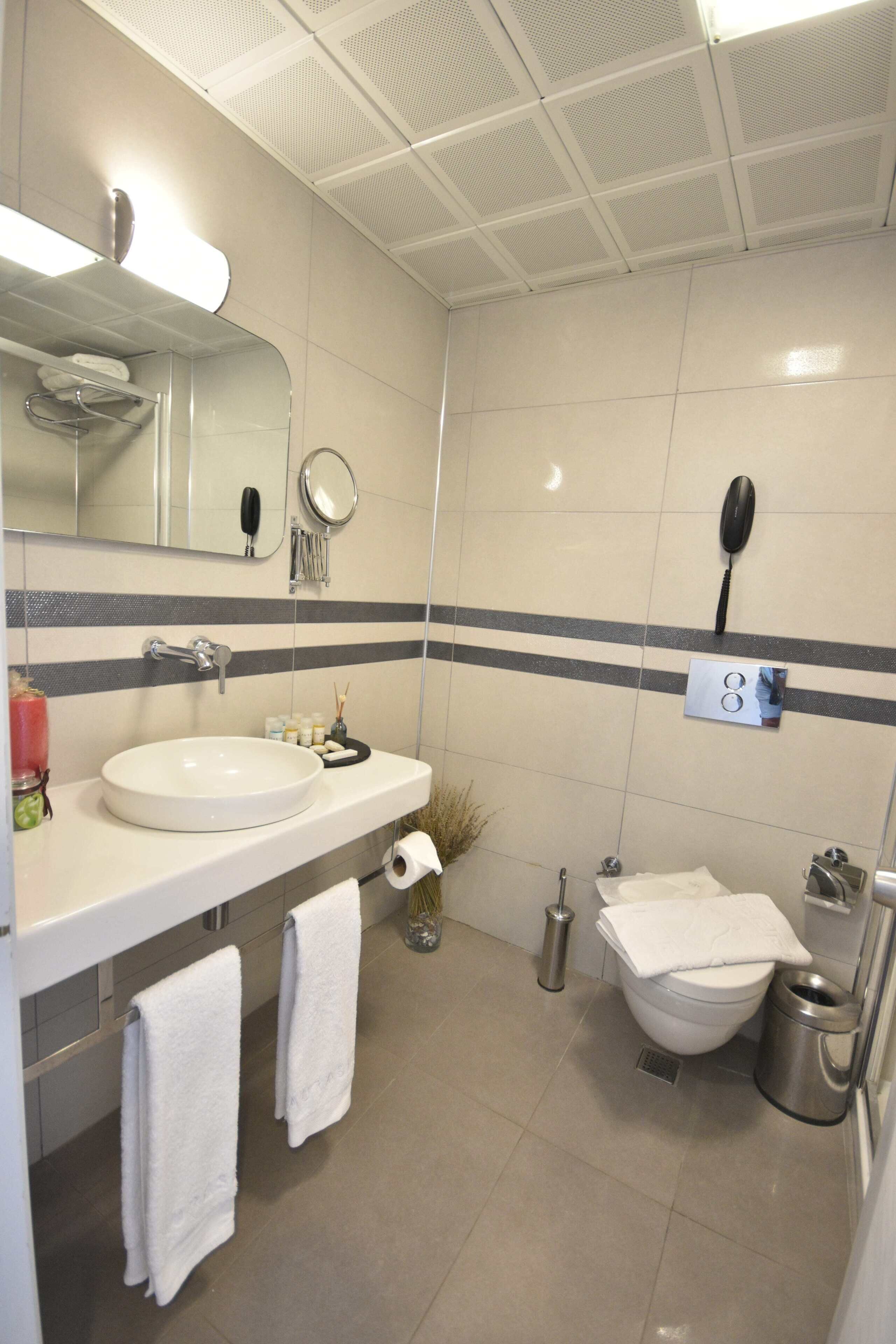 shower, free toiletries, hair dryer, slippers