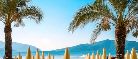 Private beach, sun loungers, beach umbrellas
