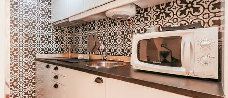 Fridge, microwave, electric kettle, toaster